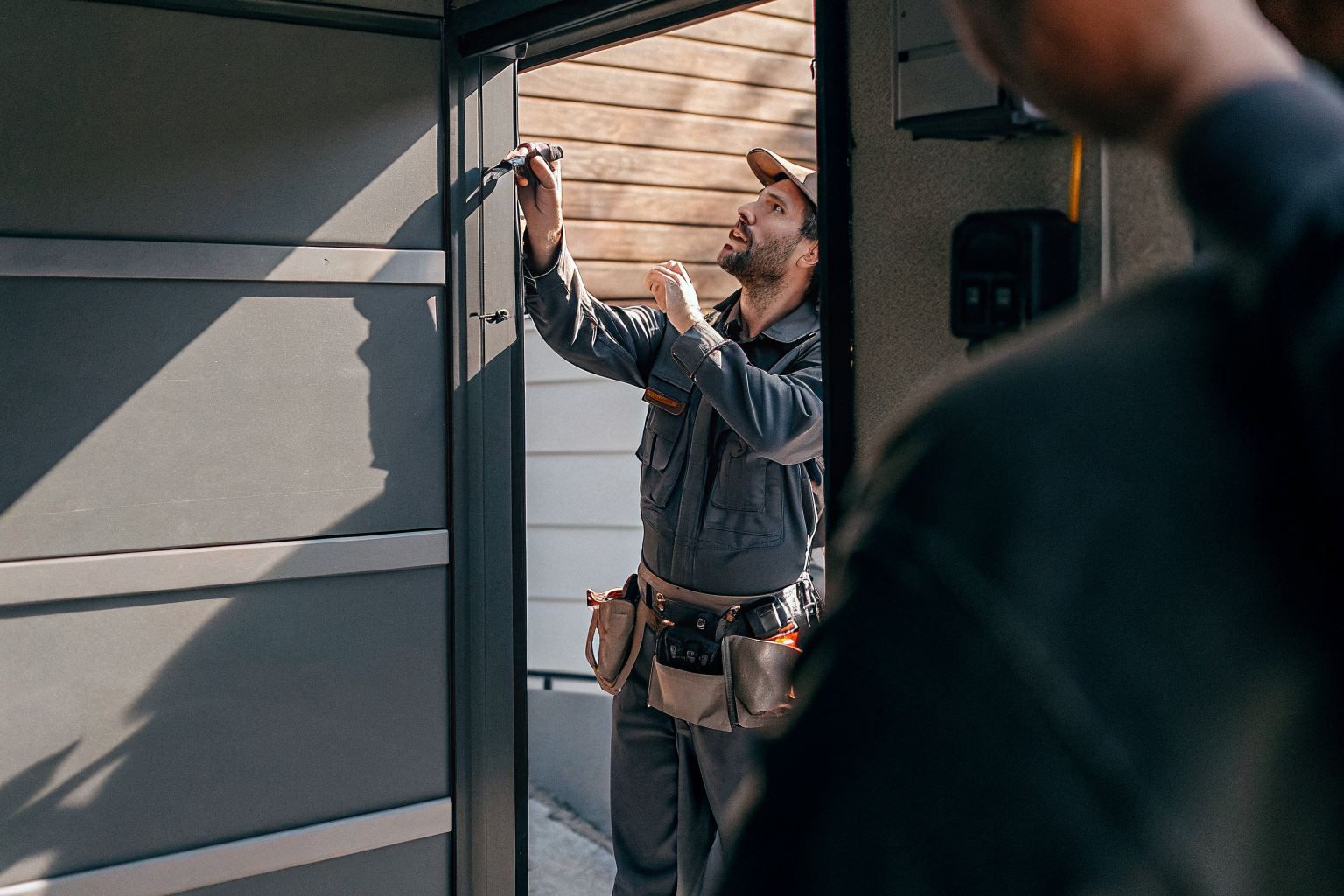 A home service technician on the job — the kind of work a ProofPilot website books around the clock